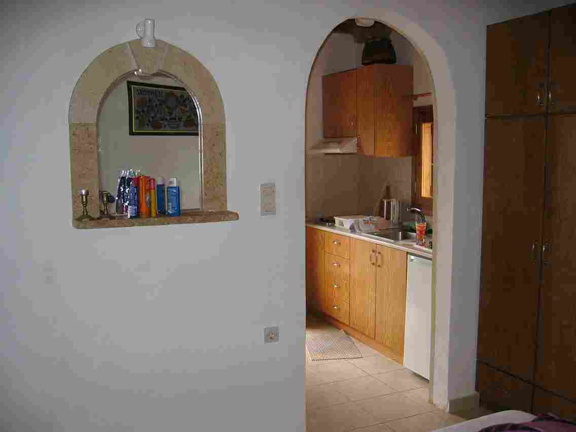 picture of view from bedroom to kitchen in Melina Apartment